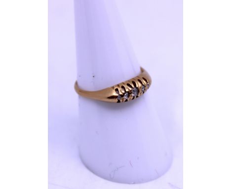 18ct Yellow Gold Old Cut Diamond Five Stone Ring.  Total Diamond Carat Weight is approx. 0.06ct.  The hallmarks are worn and 