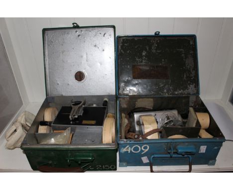 2 x vintage bus/tram/coach conductors ticket machine and tickets both boxed and labeled to denote transport company.