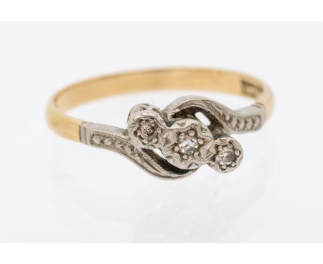 18ct Yellow Gold and Platinum Three Stone Diamond Ilusion Set Ring.  The ring contains three Melee Round Brilliant Cut Diamon