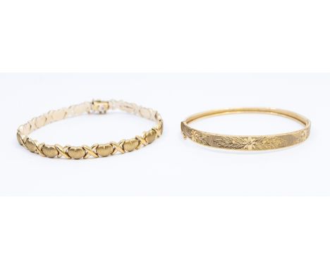 A 9ct Gold Bracelet and a 9ct Gold Hinged Bangle.  The 9ct Gold Bracelet is hallmarked "9K 375" for 9ct Gold and has Heart an