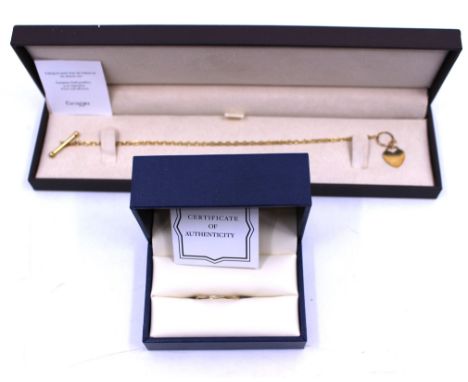 9ct Yellow Gold Bracelet with Heart Charm. Boxed and an Unmarked Yellow Metal Ring Boxed.  The Bracelet is hallmarked "375" f