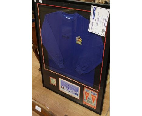 A 1968 framed Toffs European Cup Final shirt, signed by George Best, complete with ticket and official programme