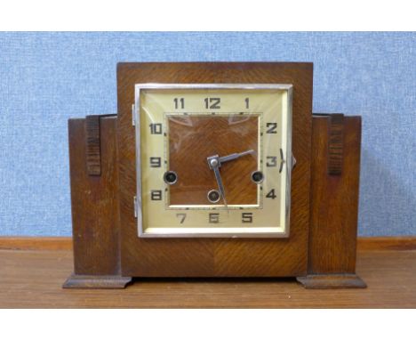 An Art Deco oak Whittington chime mantel clock