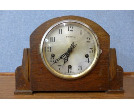 A Bravingtons oak Whittington chime mantel clock