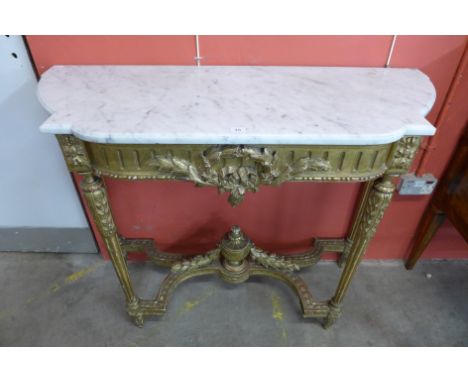 A 19th Century French carved gilt wood and marble topped console table