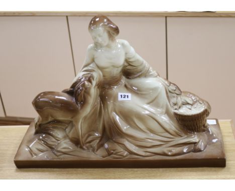 A large ceramic model of a lady and a deer, signed Polbert