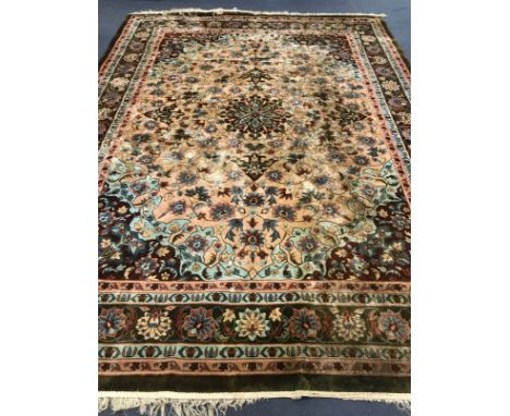 A Chinese silk pink ground carpet 370cm x 275cm