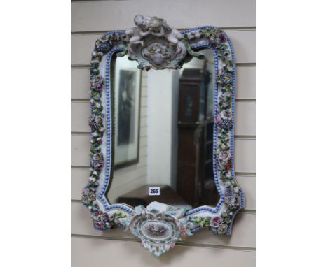 A Dresden flower encrusted wall mirror