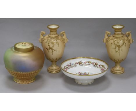 A small collection of Royal Worcester ceramics, including a pair of blush ivory twin-handled pedestal vases decorated with fl