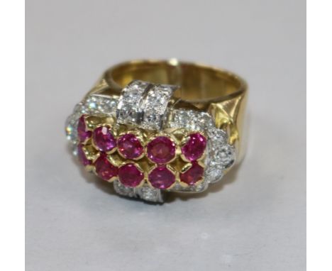 A yellow metal, ruby and diamond cluster dress ring, size O.