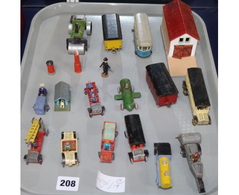 A group of nineteen late 1920's painted wooden models, including a garage building with ramp, a train, a charabane, a steam r