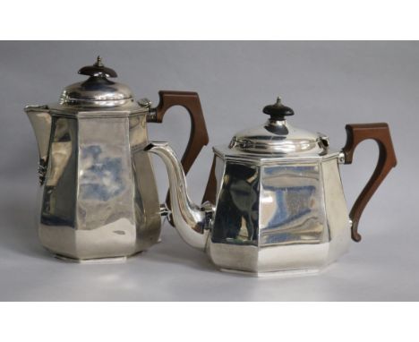 A George V silver teapot and hot water jug, William Neale & Son Ltd, Birmingham, 1930.