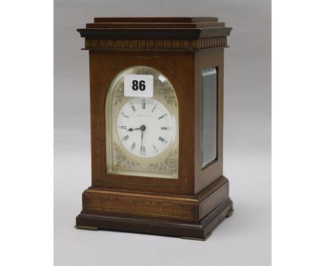 A mahogany mantel clock
