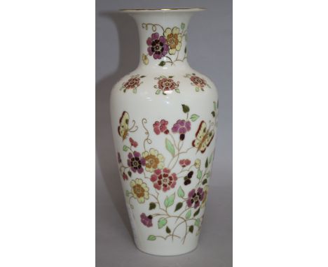 A Zsolnay vase decorated with butterflies and flowers