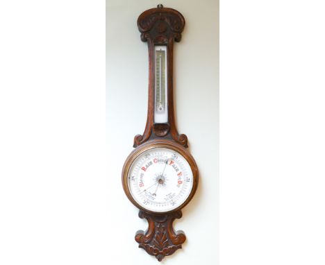 Edwardian banjo wall barometer in an oak case 