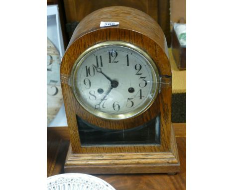 Striking bracket clock in oak case with silver dial 