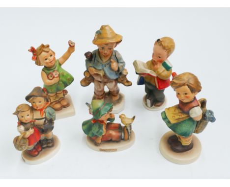 Group of 6 German Hummel porcelain figurines of children 