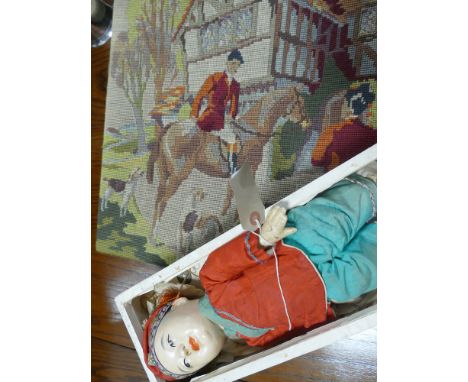 Chinese dressed doll and an unframed tapestry 