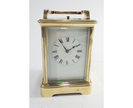 Good quality French brass repeater carriage clock - measures 18cm to top of handle
