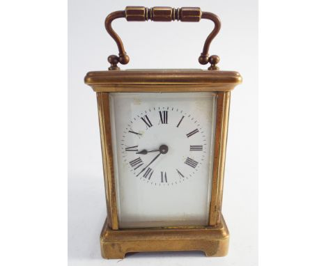 French brass carriage clock with key - measures 15cm tall to top of handle 
