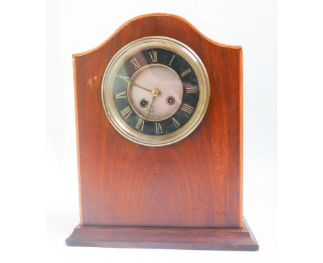 Striking bracket clock in mahogany case with black and brass dial 