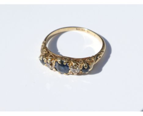 18ct yellow gold half hoop ring set with sapphires and diamonds. Ring size K/L