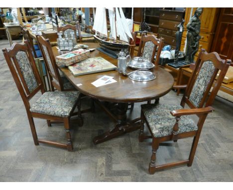 Reproduction oval oak extending dining table with leaf and four matching chairs with tapestry seats and backs and pair of mat