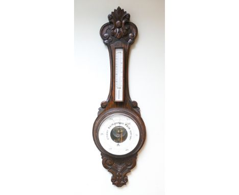 Edwardian banjo wall barometer in an oak case 