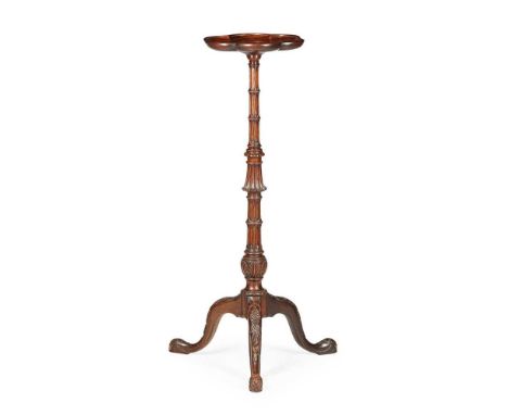 GEORGE II STYLE MAHOGANY TORCHERE STAND LATE 19TH CENTURY the scalloped piecrust top raised on ring turned and fluted stem, c