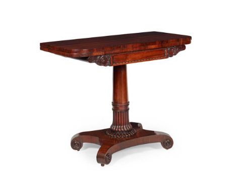 Y REGENCY ROSEWOOD TEA TABLE EARLY 19TH CENTURY the rounded rectangular fold-over top above a bead moulded panel frieze flank