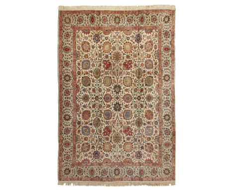 TABRIZ 'BENLIAN' CARPET NORTHWEST PERSIA, MID 20TH CENTURY the ivory field with allover palmette and foliate vine pattern, wi