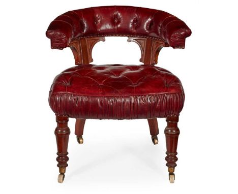 EARLY VICTORIAN LEATHER UPHOLSTERED READING CHAIR 19TH CENTURY the horseshoe shaped back and arms above shaped brackets, over