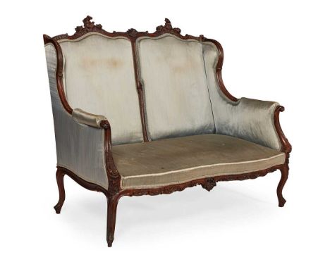 LOUIS XV STYLE WALNUT FRAMED TWO SEAT SOFA EARLY 20TH CENTURY the frame carved with rocaille, raised on cabriole legs with fo