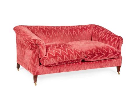 MAHOGANY FRAMED SOFA, BY HOWARD CHAIRS LTD. 20TH CENTURY the low back and scrolled arms over a deep seat with twin cushions, 