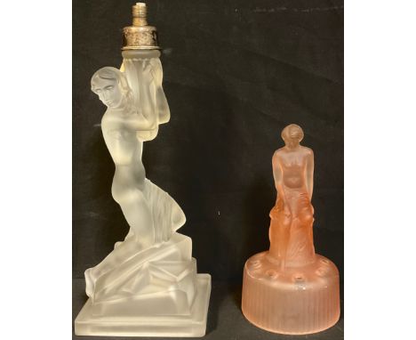 An Art Deco frosted clear glass figural table lamp, semi-clad female, angular base, 24cm; an Art Deco frosted pink glass tabl