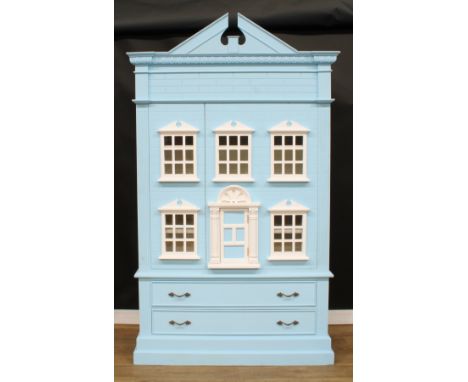 A contemporary wardrobe or linen press, as a large doll’s house, broken-arch pediment above an egg-and-dart frieze and two do