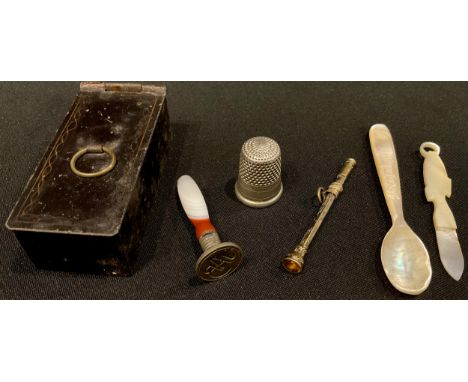 A Toleware snuff box; an agate seal; a pencil; a silver thimble; etc 