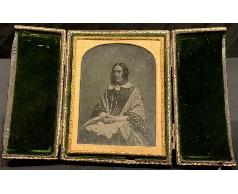 Photography - a 19th century ambrotype portrait photograph, of a lady, her hair in ringlets, arched mount, 9.5cm x 7cm, moroc