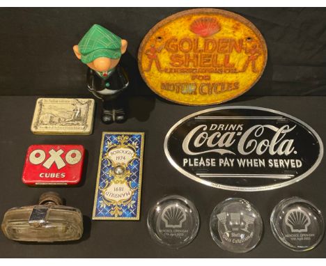Advertising - a Shell Oil for motorcycles sign; Shell Oil glass paperweights; an Oxo tin; an Avon Andy Capp bottle; Coca-Cola