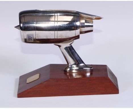Aeronautica - a chrome desk model, of a Rolls Royce RB211 aeroplane engine, removable propellor, mahogany base, 18cm long 