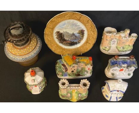 A Royal Doulton oil lamp reservoir only, Duplex twin burners, late 19th century; a Prattware type plate; four reproduction fl