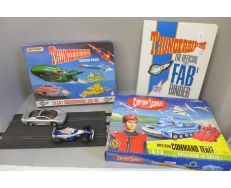 A Thunderbirds Rescue pack, Captain Scarlet and the Mysterons Spectrum Command Team, a Thunderbirds The Official Pro Set FAB 