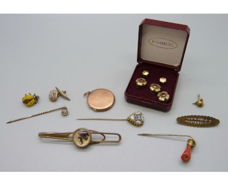 Gold plated and gold tone jewellery, stick pins including coral, a locket, tie-bar, millefiori, etc. 