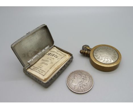 A U.S. 1888 one dollar coin, a snuff box and a lighter 