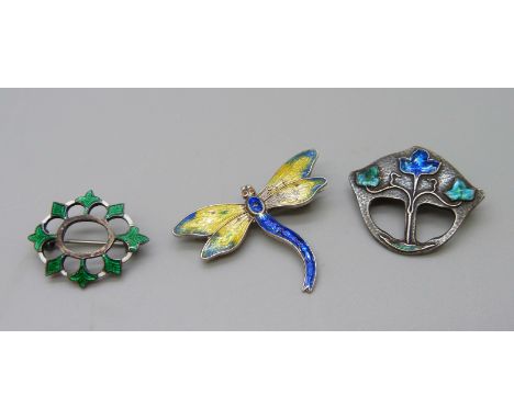 A William H. Haseler enamel brooch, Birmingham 1908, a silver and enamel dragonfly brooch, Birmingham 1918 and one other enam