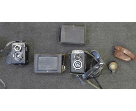 Four cameras; Lubitel 166B, Lubitel 2, Zeiss Ikon and Beck and a WWI compass 