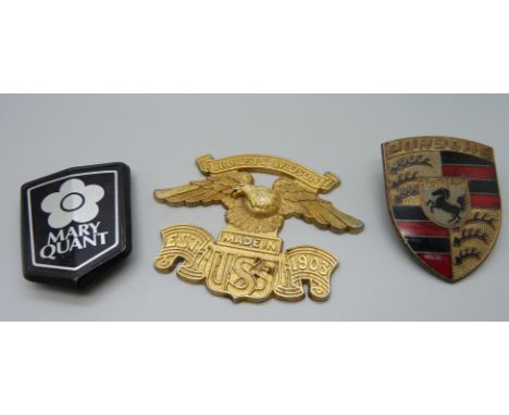 Three badges, 1978 Porsche 911/933, a Harley-Davidson badge and Mini Mary Quant 