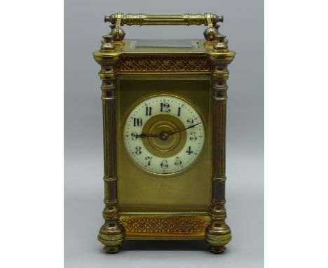 A French gilt brass and four glass sided carriage clock, 13cm 