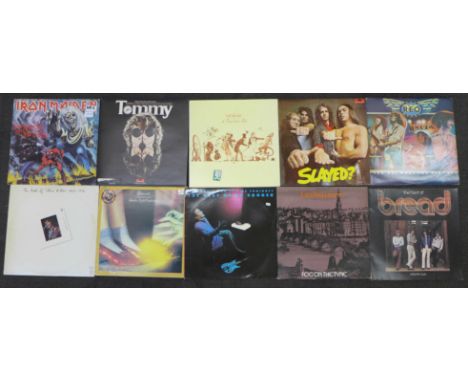 Ten various rock LP records including Iron Maiden, The Who, Genesis, Slade, etc. 