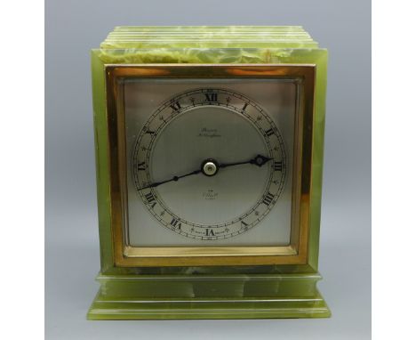 An onyx mantel clock, retailed by Poyser of Nottingham with Elliott movement 